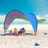 TOBTOS Beach Tent sun shade setup shows quick, wind-stable shelter for family beach days.