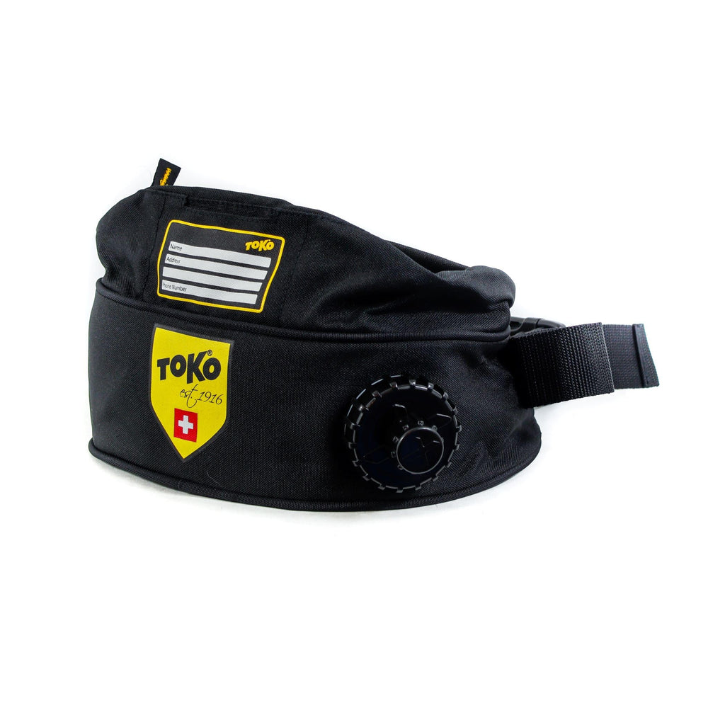TOKO insulated drink belt in yellow with 1L storage and LED flashlight for hands-free hydration.