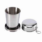 Tomedny collapsible cup folded with keychain, ideal for travel and quick access.
