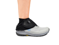 Topo Athletic gaiter back closure highlights secure 3-hook system for stable fit.