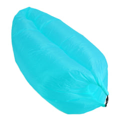 Topyond inflatable lounger blue, outdoor lounging by the water.