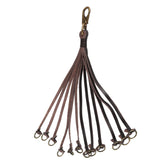 TOURBON leather hunting strap attached to belt for hands-free field transport.