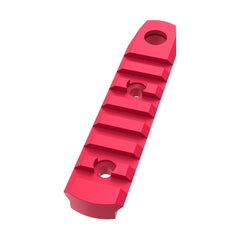 Close-up of CNC-machined 7-slot red MK7-QD rail.