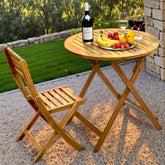 Tranquillo Anya foldable round acacia table, ideal for saving space on small patios.