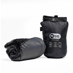 trtl Mini Wrap compact travel blanket folded for easy packing