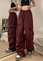TSMNZMU women's baggy cargo pants zip fly button closure keeps the fit neat.