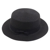 Tuduoms women's straw boater hat with a wide brim for sun protection and style.