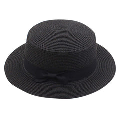 Tuduoms women's straw boater hat with a wide brim for sun protection and style.