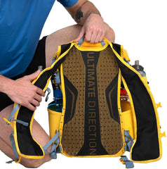 Ultimate Direction Fastpack 20L harness pockets keep snacks and water within easy reach