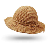 UltraKey Straw Hat foldable wide-brim for kids shields from sun on busy beach days.