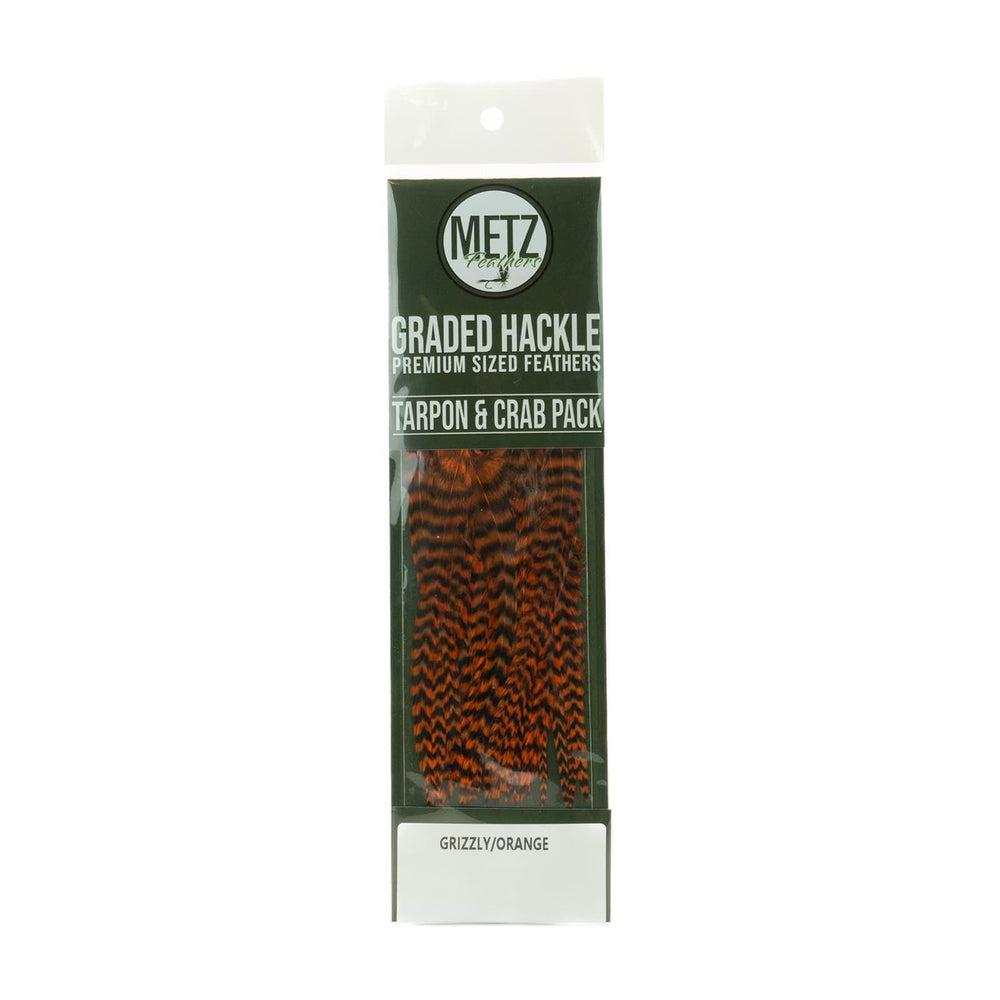 Umpqua Metz tarpon/crab hackle pack in grizzly orange for consistent tails and bushy collars.