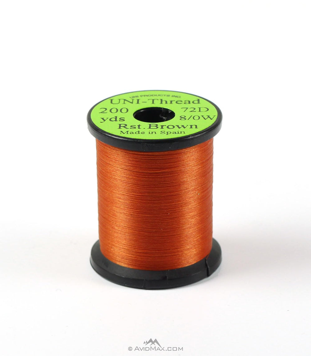 Umpqua UNI Waxed Thread 8/0 Rusty Brown for durable dry flies and tight wraps.