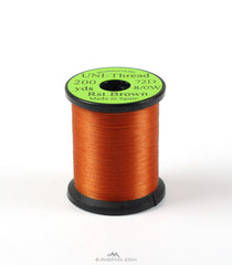Umpqua UNI Waxed Thread 8/0 Rusty Brown for durable dry flies and tight wraps.