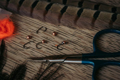 Umpqua XC 210BL-BN 1X Short hook enhances accuracy on compact nymphs.