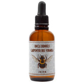 Uncle Dunkels Carpenter Bee Formula bottle pour for easy outdoor application and targeted scent release