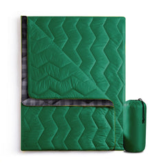 UNIKOME outdoor blanket with waterproof coating for damp campsite comfort.