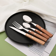 Uniturcky dinner spoons with mirror finish and ergonomic wooden handles.