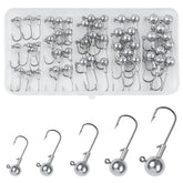 Close-up of unpainted round ball jig head with sharp hook