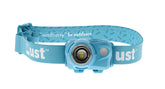 UST Brila 580 headlamp front view with bright beam for distance.
