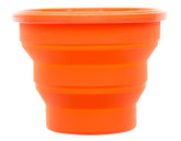ust FlexWare Bowl Orange collapsed for compact storage and travel