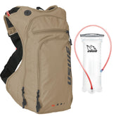 USWE Outlander Moto hydration pack sand close-up bottle for quick refills.
