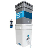 Uzima UZ-2 gravity-fed setup demonstrates portable filtration at a campsite.