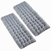 VaygWay grey camping cot pad folded for compact portability during travel and hikes.