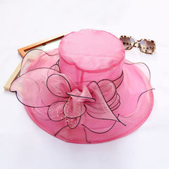Vintage Cloche Hat features a delicate side flower for warmth.
