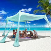 VIONMI Beach Canopy 10x10 pop-up setup shielding family from sun.