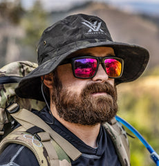 Vortex Shade Country Bucket Hat side view showing wide brim for sun protection.