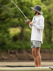 Vortex Sun Slayer Boonie Hat worn on a hiker, lightweight and breathable for outdoors
