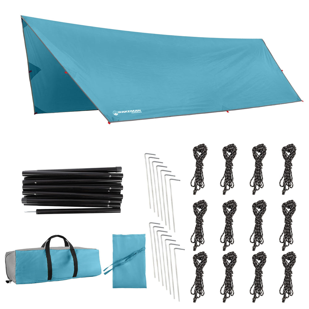 Wakeman portable camping tarp blue fully deployed shelters you from rain and sun.