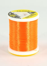 Wapsi Ultra Thread 140 Denier fluorescent orange on spool for durable fly tying