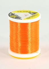Wapsi Ultra Thread 140 Denier fluorescent orange on spool for durable fly tying