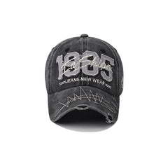 Washed Baseball Cap black side view shows adjustable fit.
