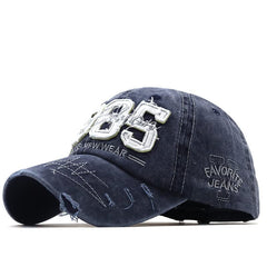 Front view of navy blue washed denim baseball cap