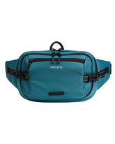 Waterfly 3L large fanny pack opening for quick access during travel.
