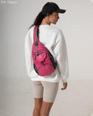 Waterfly folded sling bag stored inside interior pouch for compact travel
