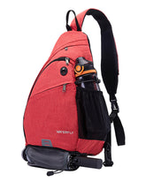 Waterfly sling bag main pocket open shows 13-inch laptop and daily essentials