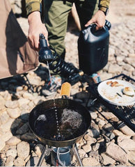 WaterPORT GoSpout pump-cap-action demonstrates easy pressurization for on-site rinsing.