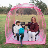 Weather Proof Pod pink front view, compact shelter for outdoor events.