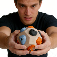 WEMONAKAIK handmade stone ball for on-the-go finger strength training.