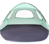WhiteFang Beach Tent mint green provides UV protection for a shaded family day.