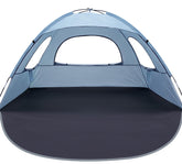 WhiteFang Beach Tent Sierra Blue provides UV shade for comfortable beach days.