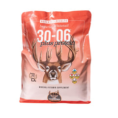 Whitetail Institute 30-06 mineral bottle attracting deer with balanced nutrition.