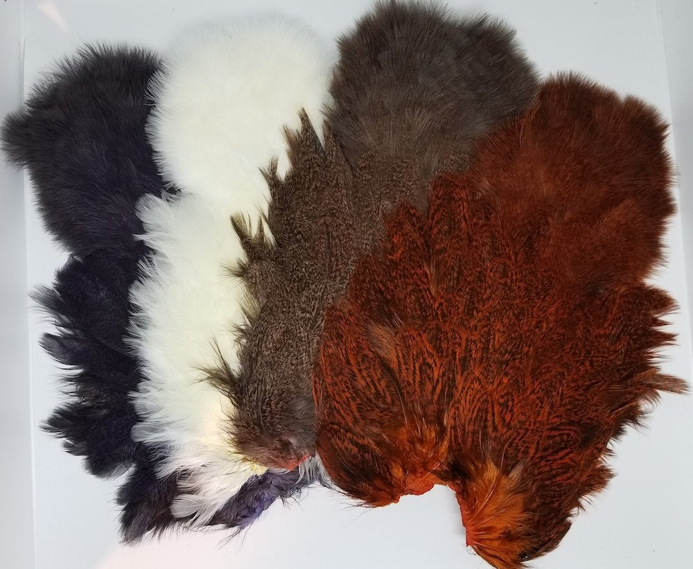 Whiting Farms Coq De Leon Hen Soft Hackle with Chickabou in speckled orange for subsurface patterns