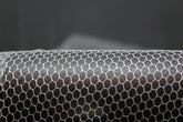 Whitmore Farm LLC medium mesh lure netting close-up, flexible masking for airbrushing.
