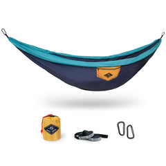 WHTE MOSS Suparpine II hammock setup in deep blue for easy outdoor lounging on a sunny campsite
