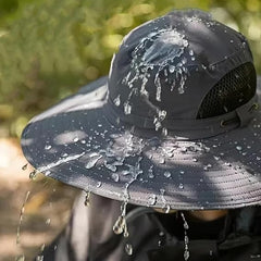 Model wearing black wide brim solar fan hat outdoors