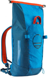 Wild Country Syncro backpack approaching terrain with gear ready for multi-pitch climbs.